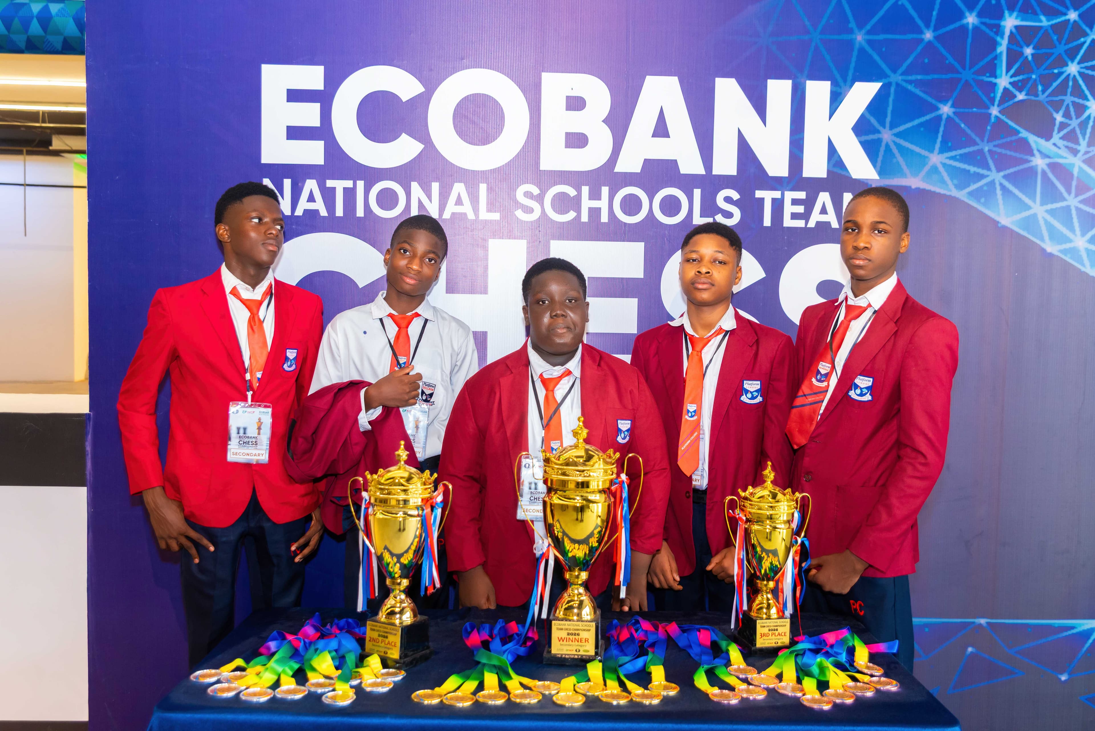 Platform Schools chess team with the Ecobank National Schools trophies